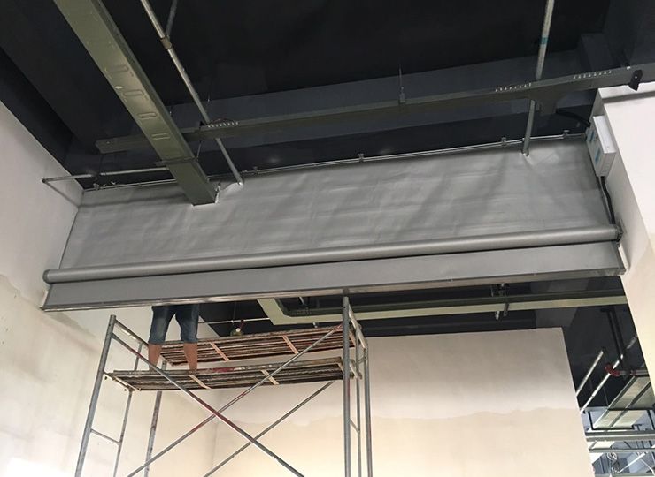 卷帘式电动挡烟垂壁是什么材质？